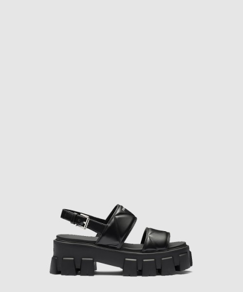 프라다 모놀리스 레더 스트랩 통굽 샌들 1X040N