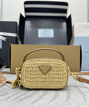 프라다 우븐 원단 및 가죽 미니 파우치 1NR025