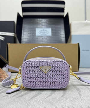 프라다 우븐 원단 및 가죽 미니 파우치 1NR025