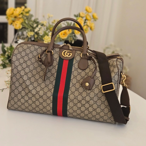 구찌 오피디아 GG 수프림 미디엄 캐리온 더플백