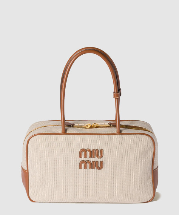 미우미우 캔버스 및 가죽 보백 5BB163