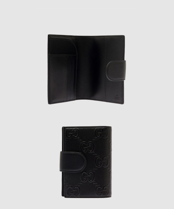 구찌 인터로킹 G 여권지갑 724562